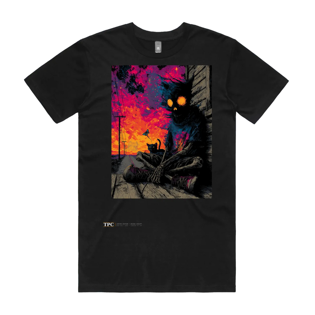 Quietly Existing Variant B black t-shirt front — TPC tee with a hooded skeleton and black cat at sunset