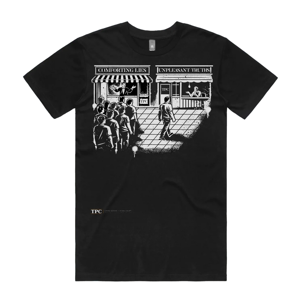 Comforting Lies black t-shirt front — TPC tee illustrating two queues, Comforting Lies versus Unpleasant Truths