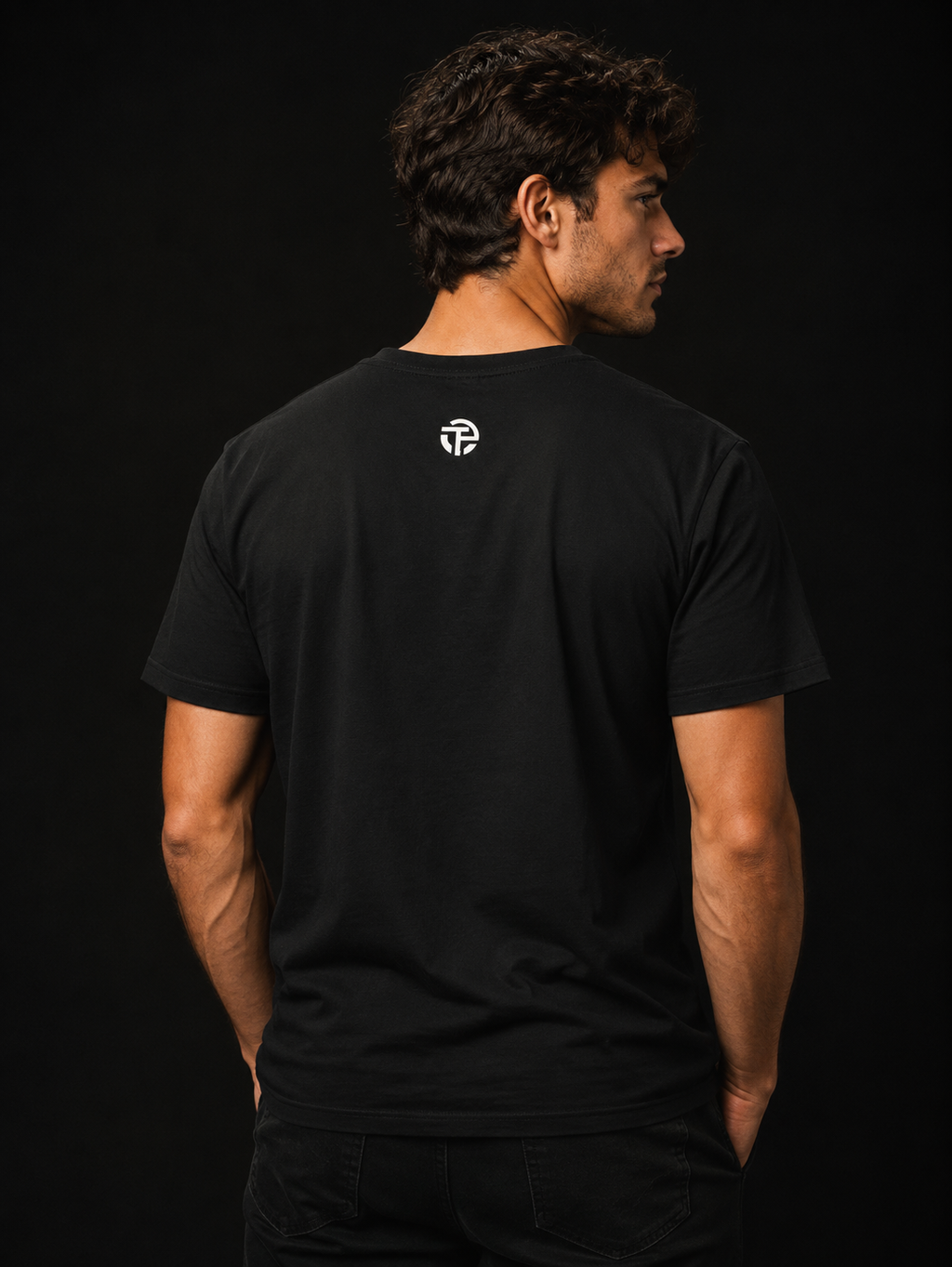 Model wearing the TPC Comforting Lies black tee, back view