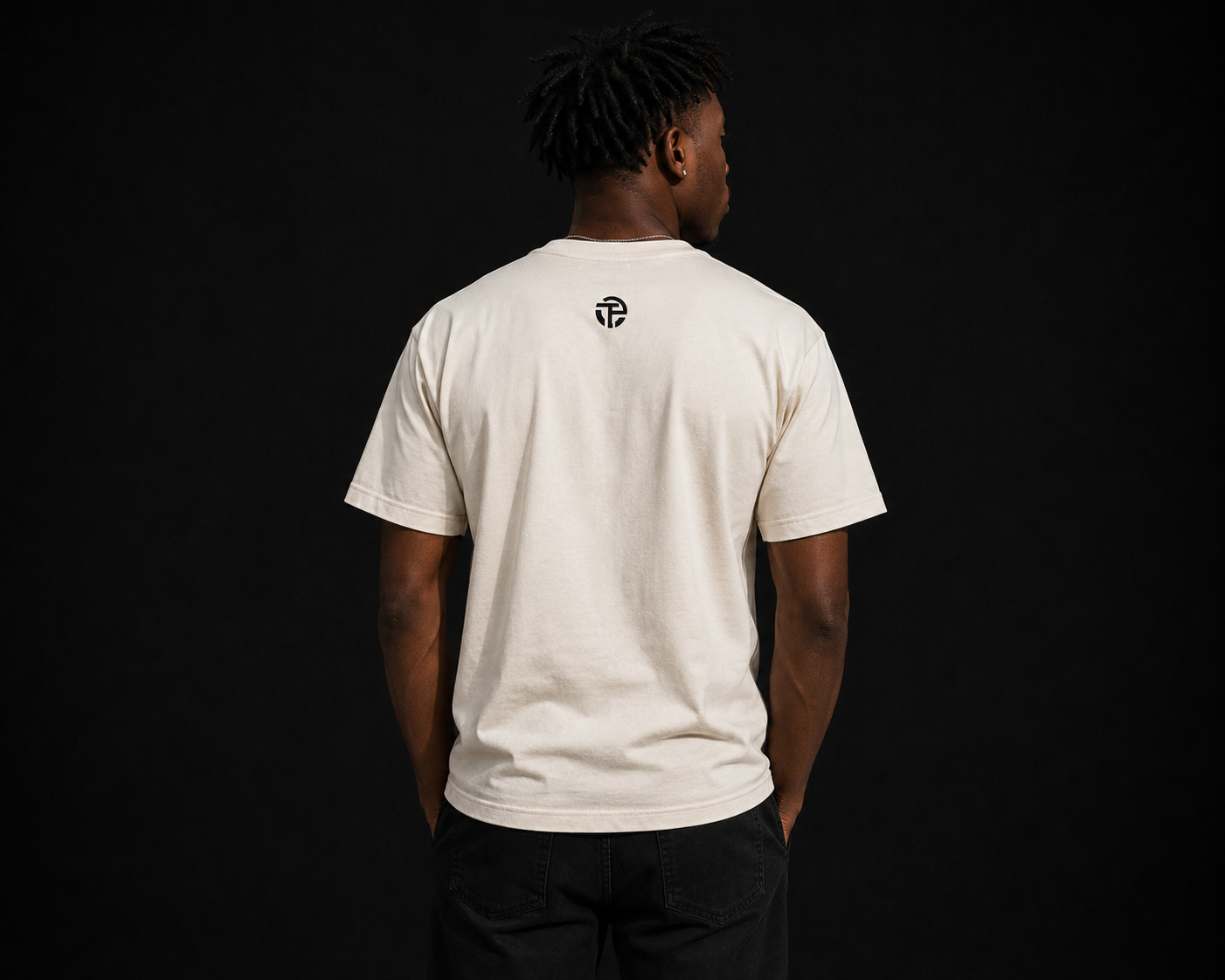 Model wearing the TPC Wounds tee, back view
